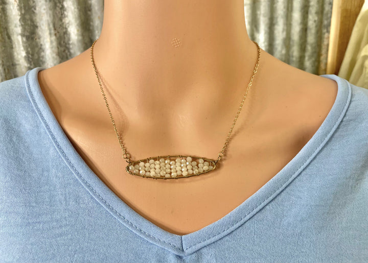 Beaded Oval Pendant Necklace