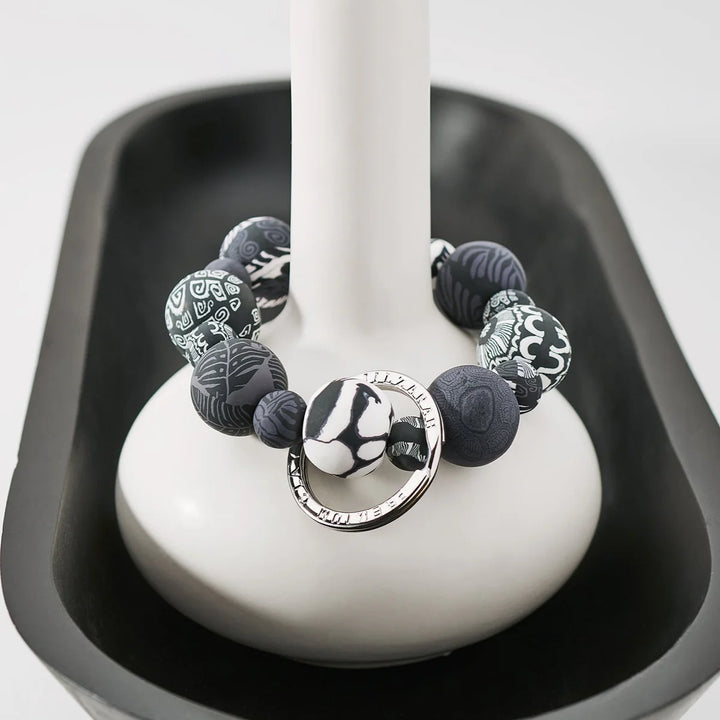 Canary Gold Wrist Keychain | Noir