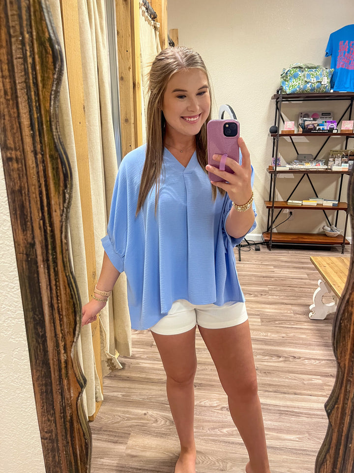 The Iris Woven Airflow V-neck Top| Spring Blue