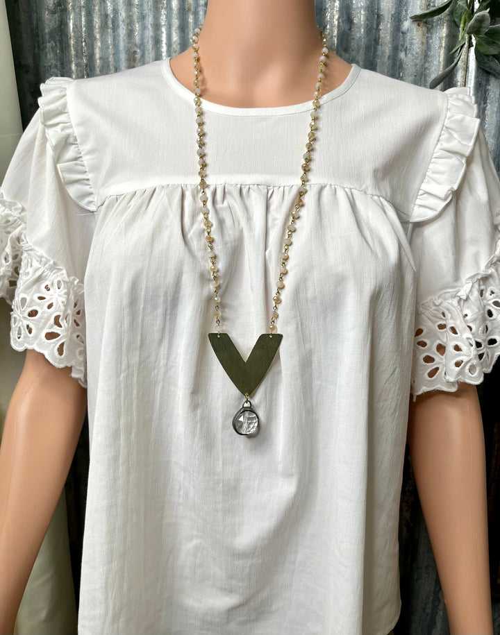 Ivory Beaded Necklace with Crystal Ball Pendant