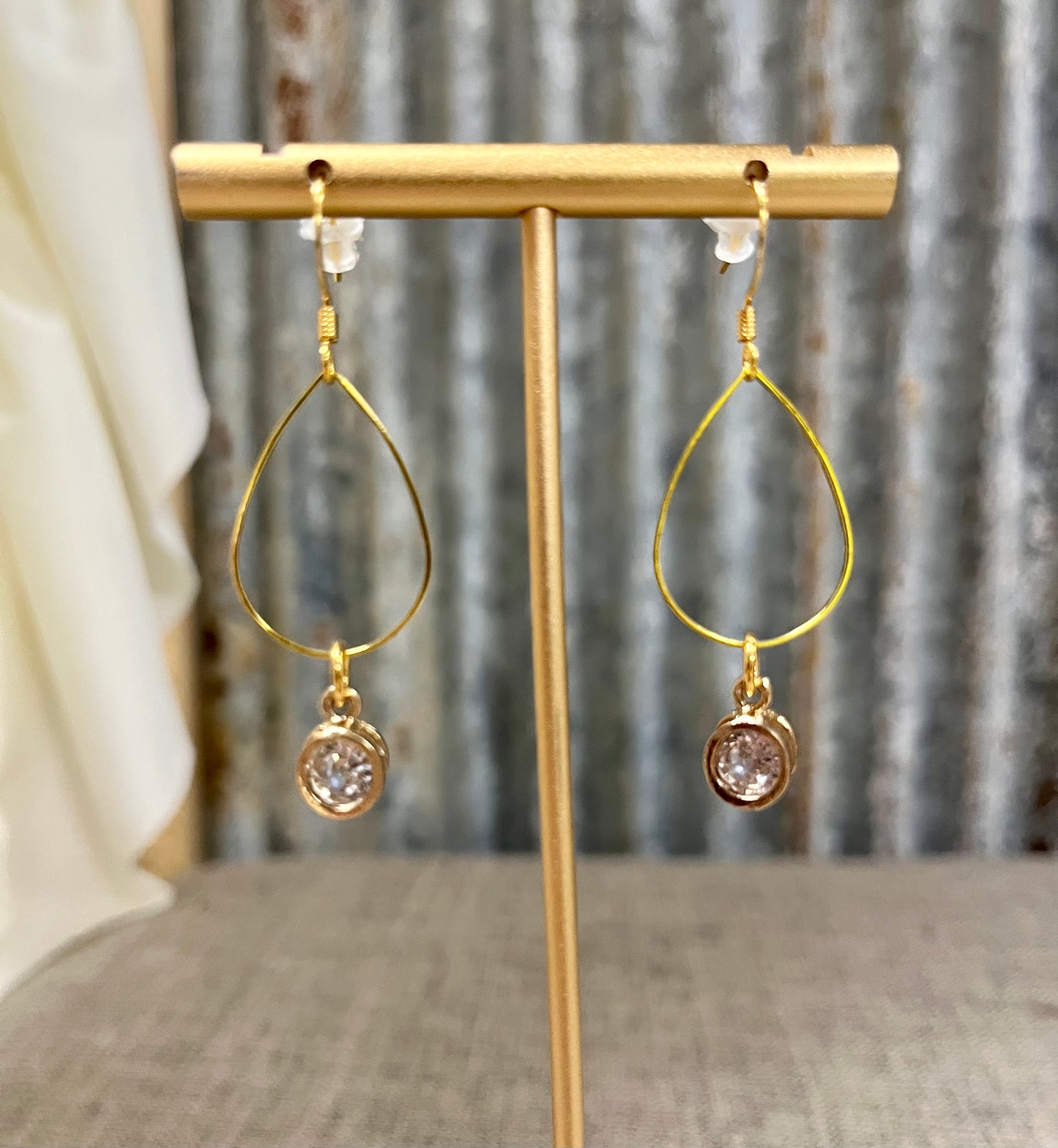 Gold teardrop diamond earrings