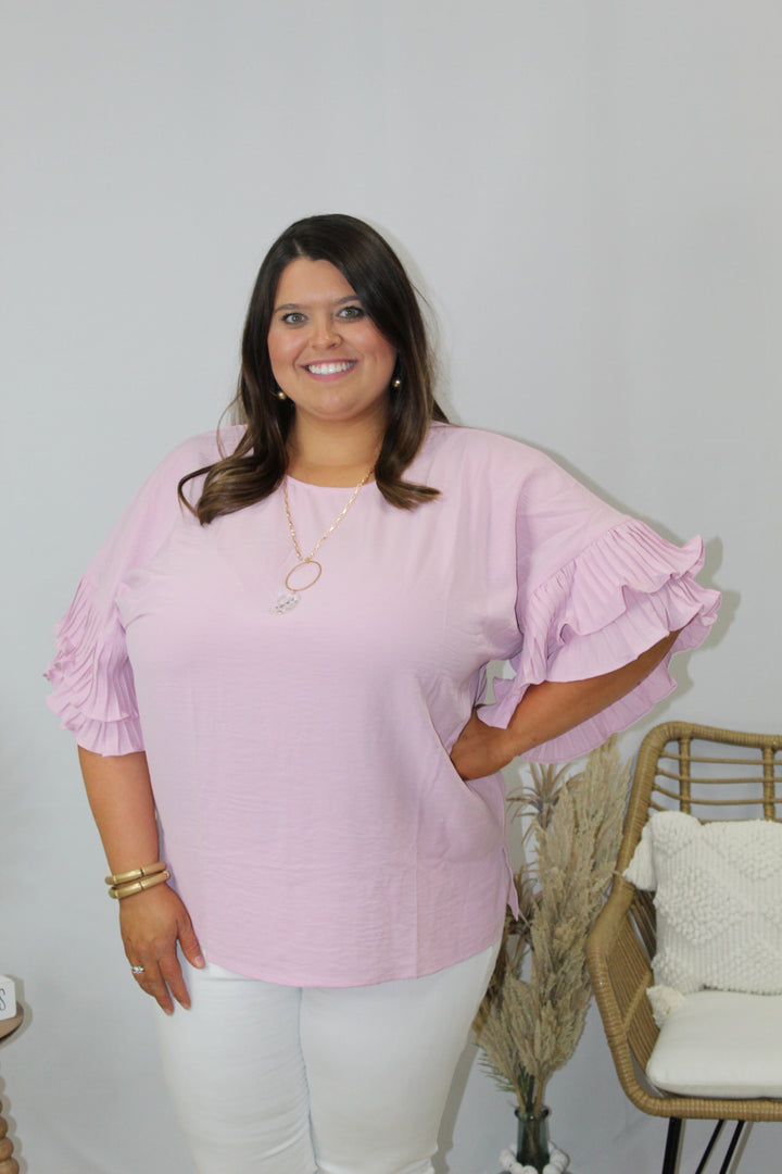 Plus baby pink ruffle sleeve top